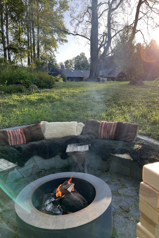 FIRE PIT-  with the villa in the background and the lake for view great sunsets and evenings here