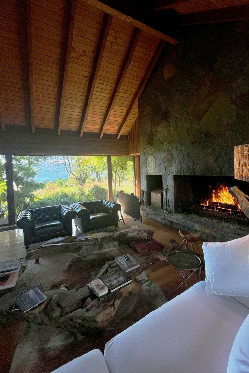 High ceilings, a glowing fire, and Chilean details throughout